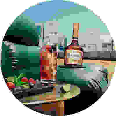 bottle of cognac with a cocktail