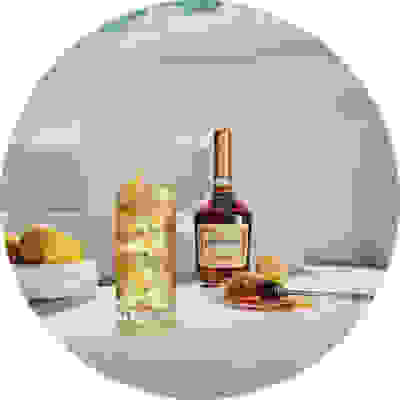 bottle of cognac with a cocktail