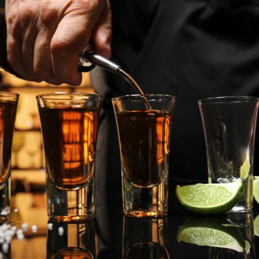 bartender pouring shots