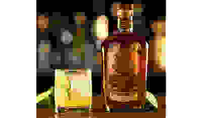 bourbon cocktail with bottle