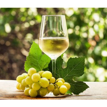 White wine with grapes